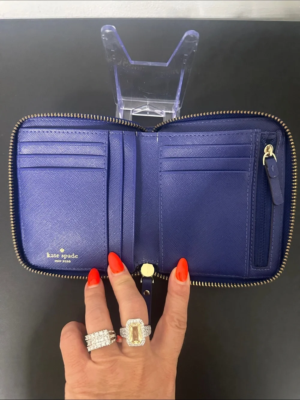 EUC kate spade cobalt blue laser-cut zip wallet with gold logo and Gold Zipper